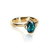 The Honey Petal Ring by Vlad Kladko of Vido Jewels, made with 14K gold and London blue Topaz. 
