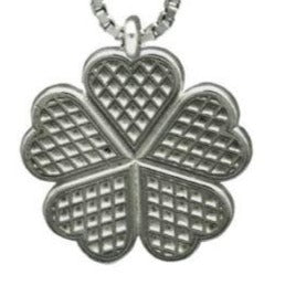 Linn Sigrid Bratland from Telemark, Norway features the Waffle Plate Pendant Small. Norwegian Jewelry